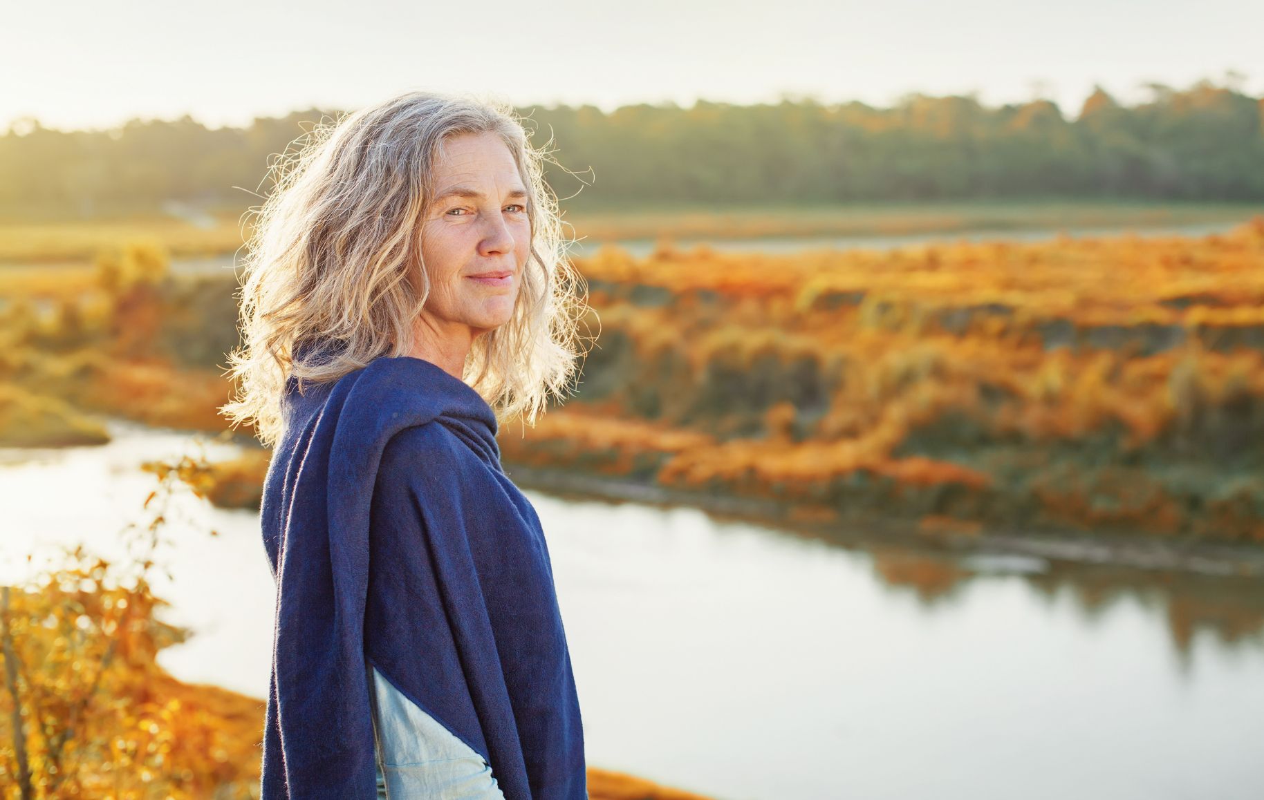 woman standing by river